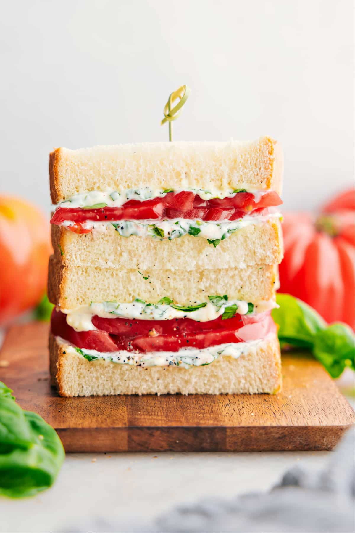 Tomato Sandwich stacked on top of each other showing the delicious inside.