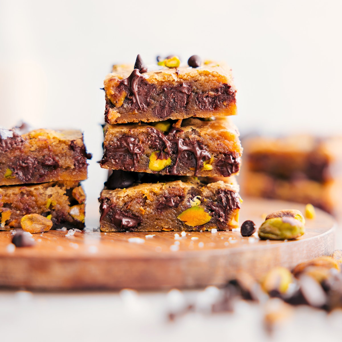 Blondies stacked on top of each other showing the yummy mix-ins and delicious texture.