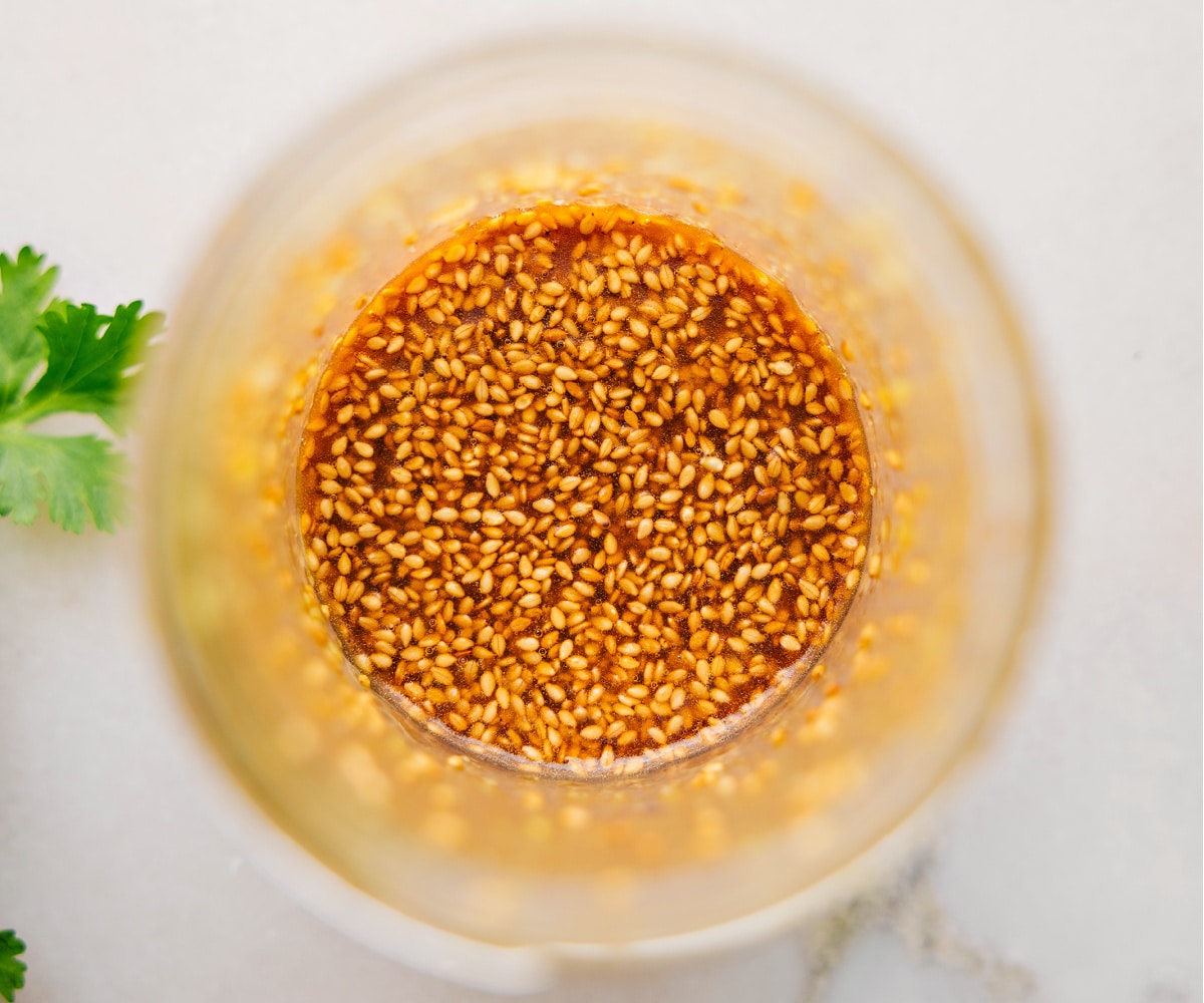 The dressing all mixed together in a mason jar for this recipe.