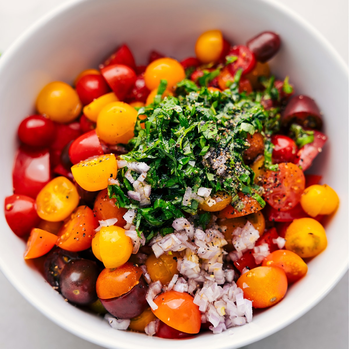 All the ingredients in this recipe in a bowl ready to be tossed together.