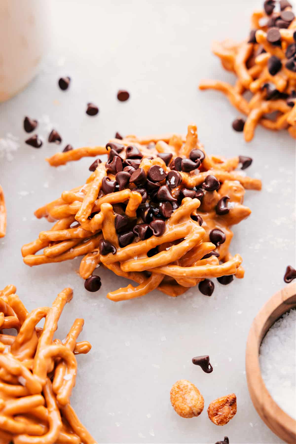 Haystack cookies topped with mini chocolate chips and flaky sea salt.