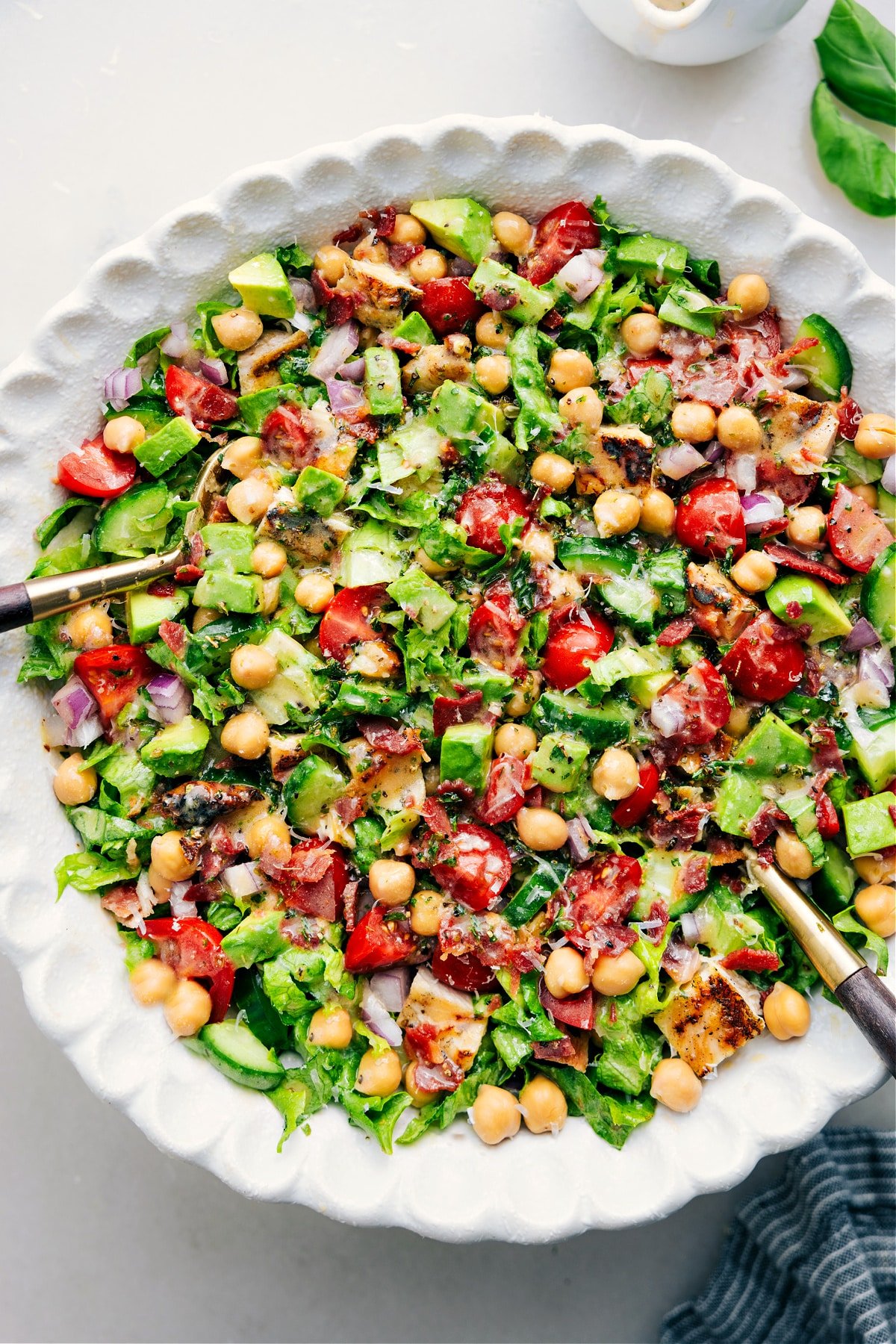 Chopped Chicken Salad mixed in a bowl with dressing.