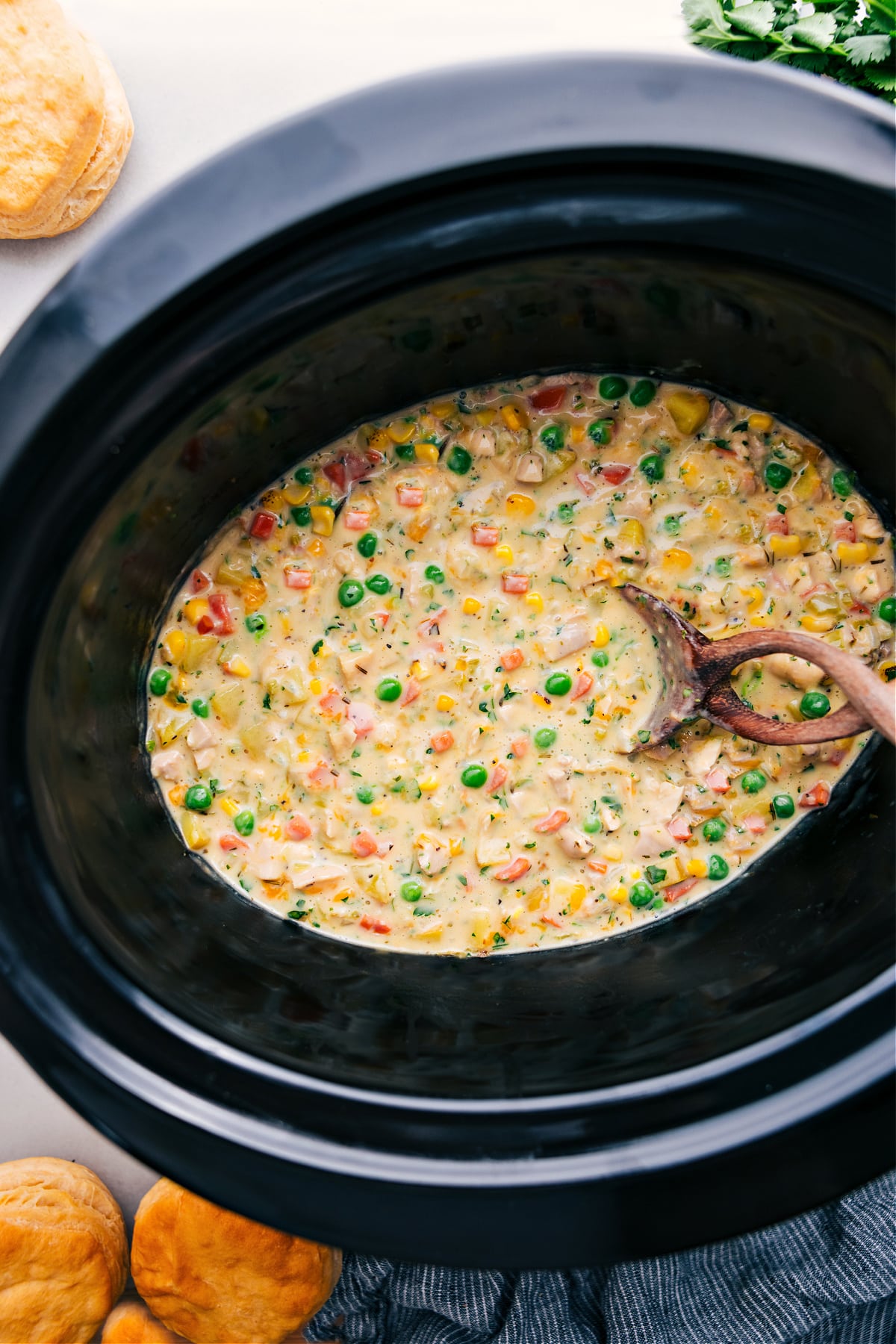 Crockpot Chicken Pot Pie cooks in the slow cooker, ready to serve and enjoy.